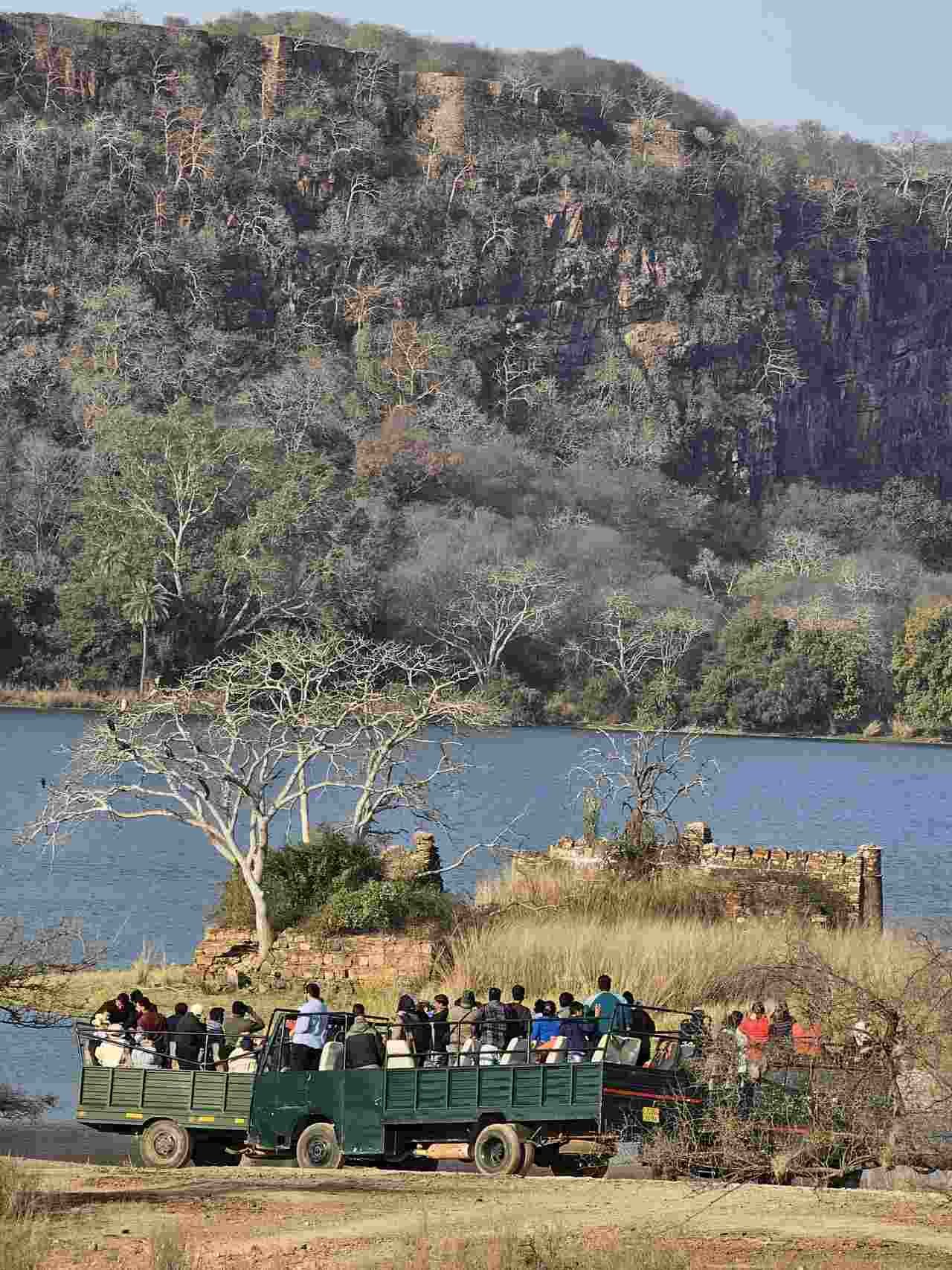 Group of tourists seated in a canter safari at Ranthambore Tiger Reserve